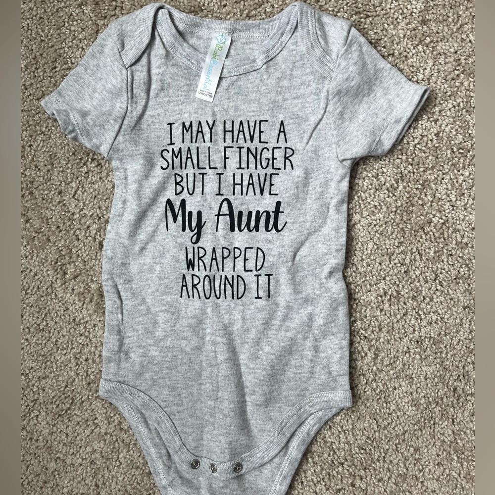 Baby Onesie “I May Have a Small Finger But I Have My Aunt Wrapped Around It”